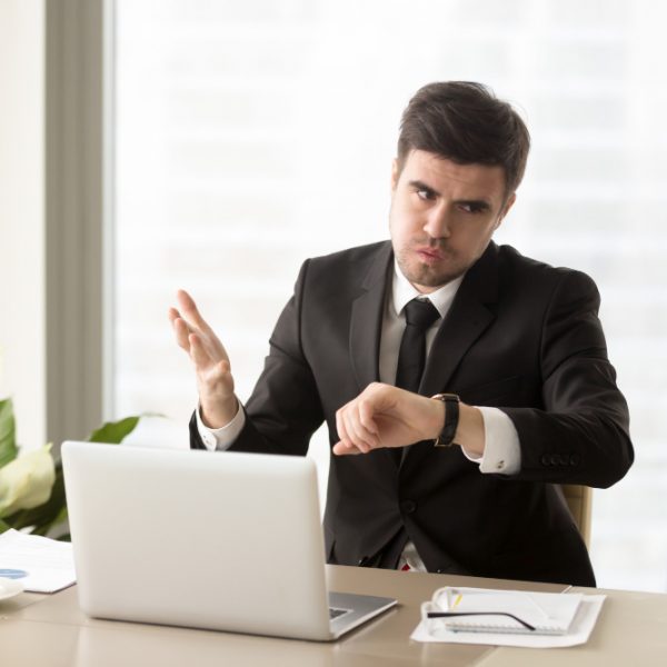 Employee looking at wrist watch