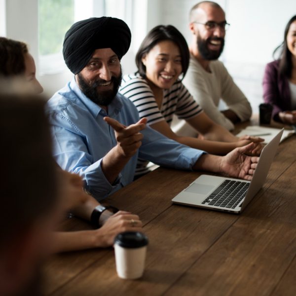 Employee discussing in office