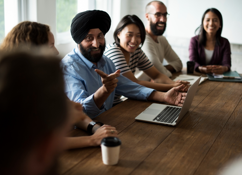 Employee discussing in office